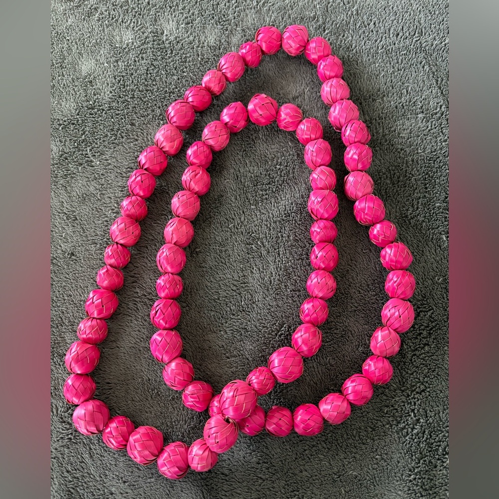 2/$20 Long, hot pink necklace of woven beads